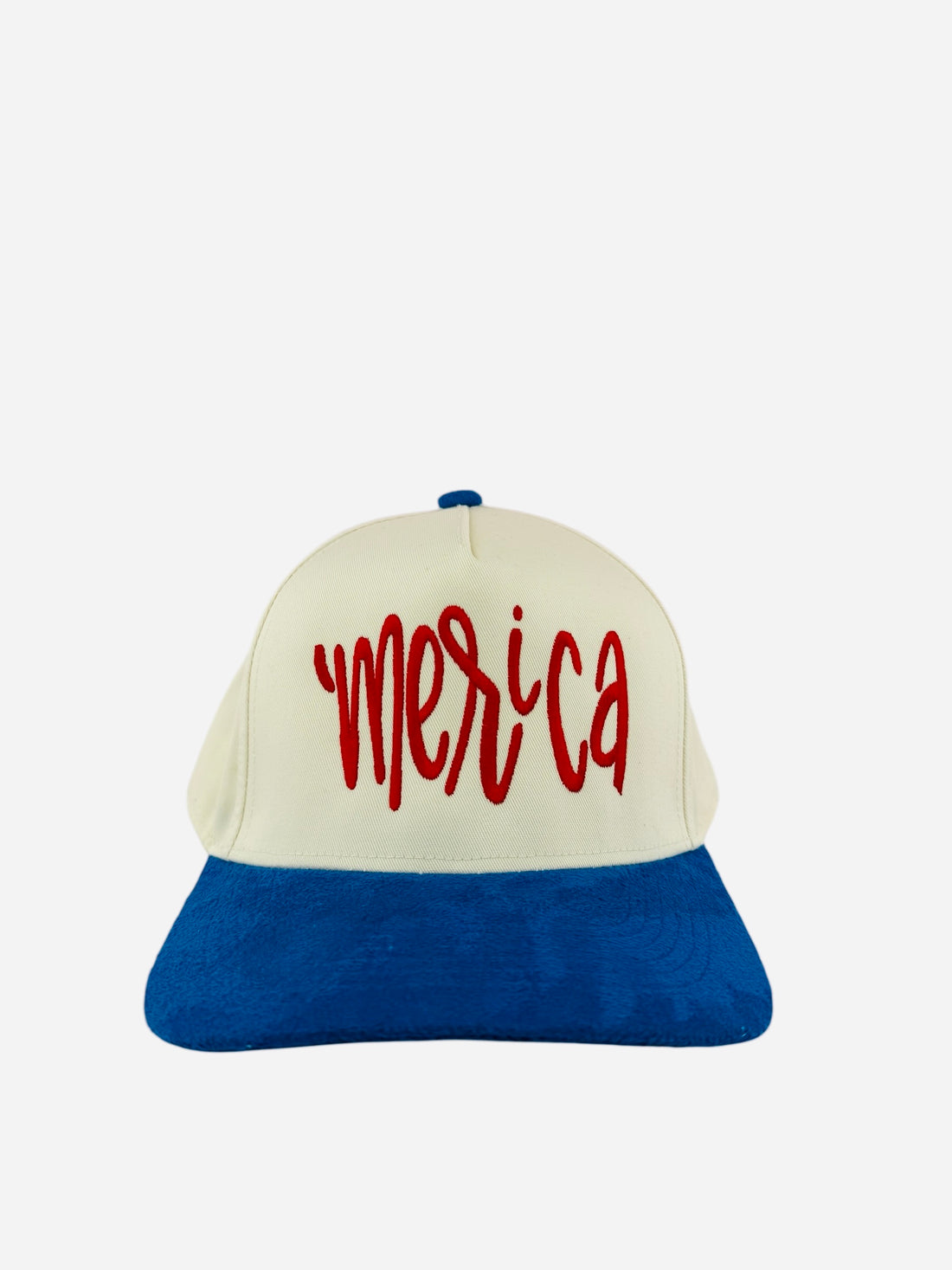 Cap with 'Merica' on a boat with ocean view