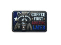 Patch with a raccoon holding a coffee cup and text 'Coffee First, Adulting Later' on a white background