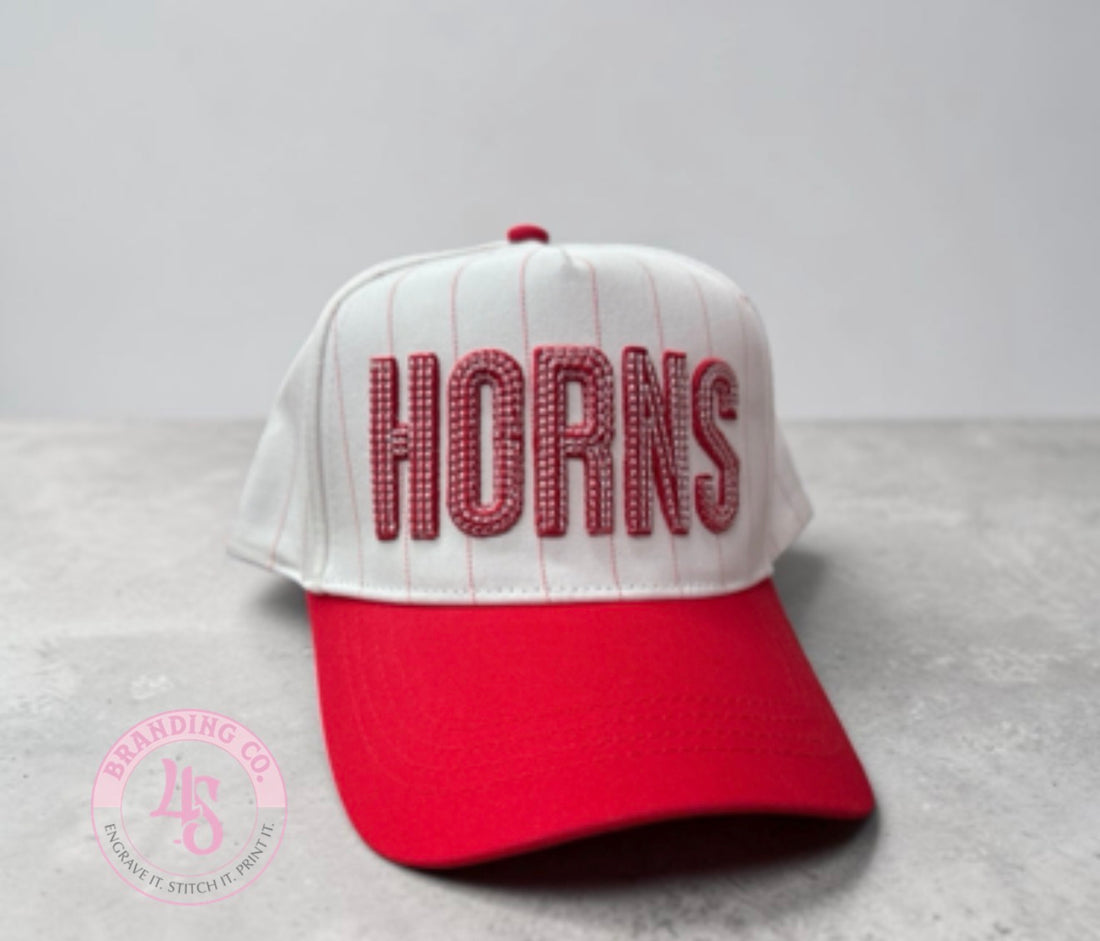 Baseball cap with 'INDIANS' text on a white background