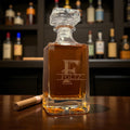Foltz whiskey decanter with a cigar on a wooden table, with a bar setting in the background.