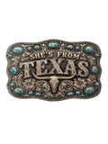 Belt buckle with 'She's From Texas' text and decorative elements on a white background