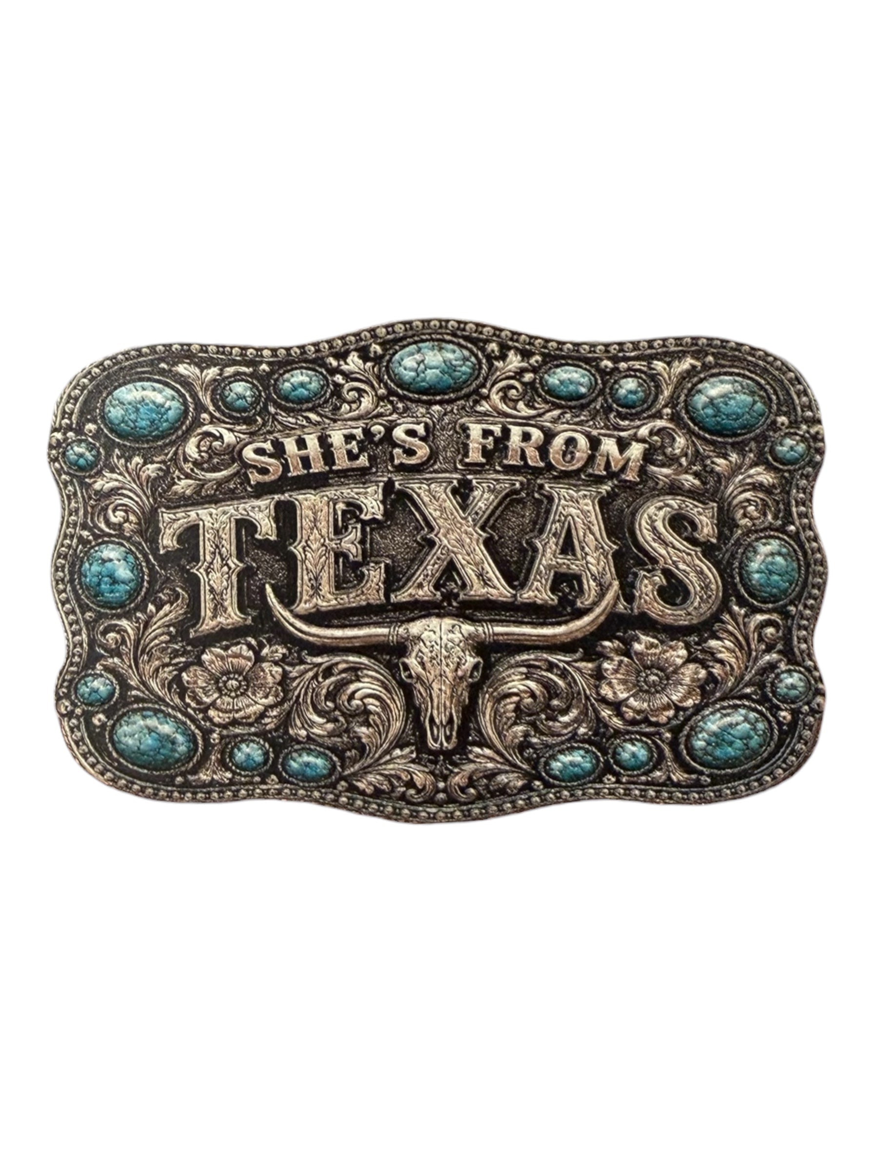 Belt buckle with 'She's From Texas' text and decorative elements on a white background