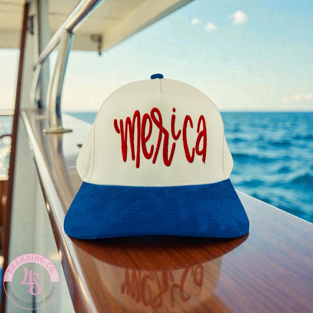 Cap with 'Merica' on a boat with ocean view
