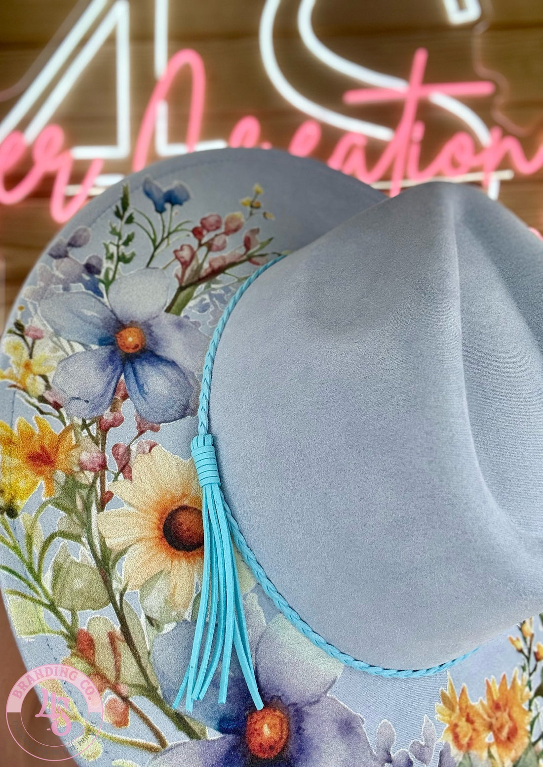 Decorative plate with floral design on a wooden surface